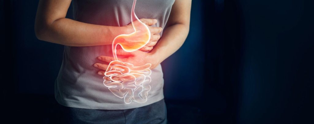 Woman touching stomach painful suffering from stomachache causes